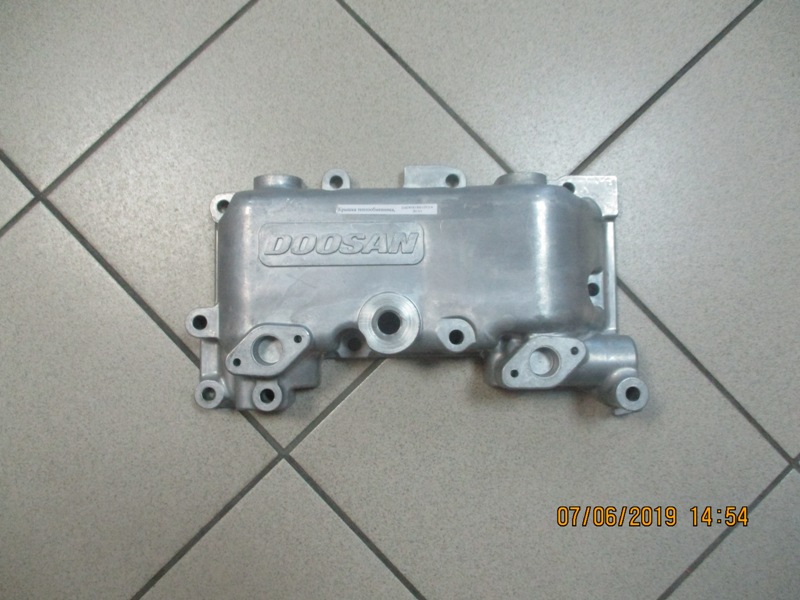 Крышка теплообменика ДВС DV11 Daewoo BH120